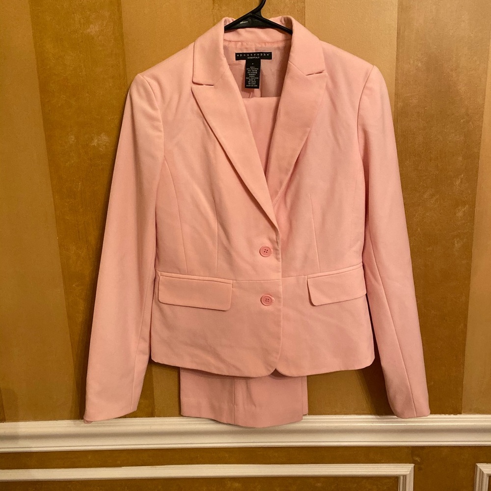 Woman's Pink Business Suit Apostrophe